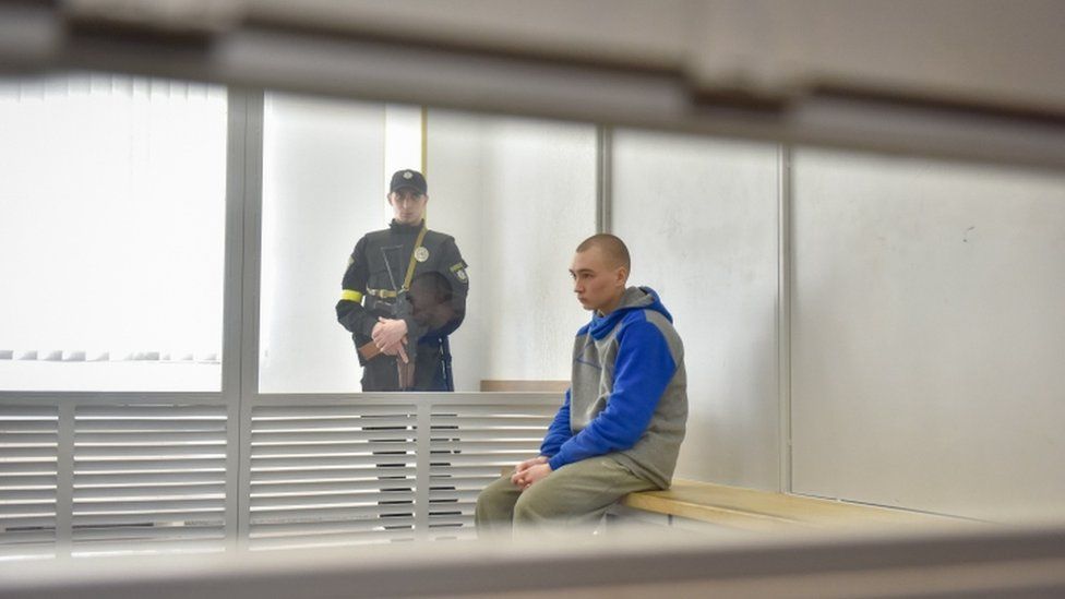 Image shows Vadim Shishimarin sitting in dock