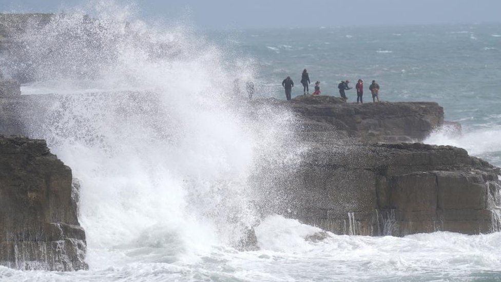 Waves crashing against the shore in Portland, Dorset
