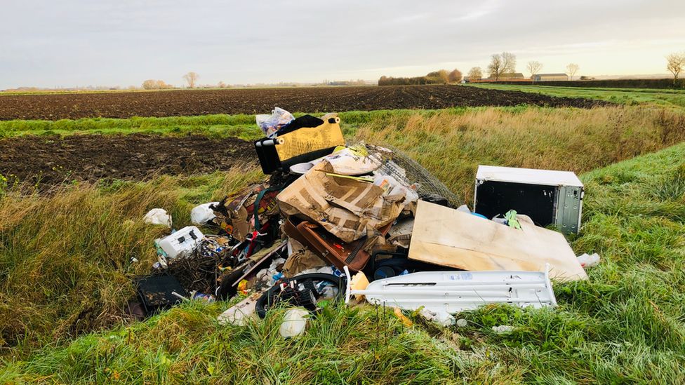 fly tipping in a field