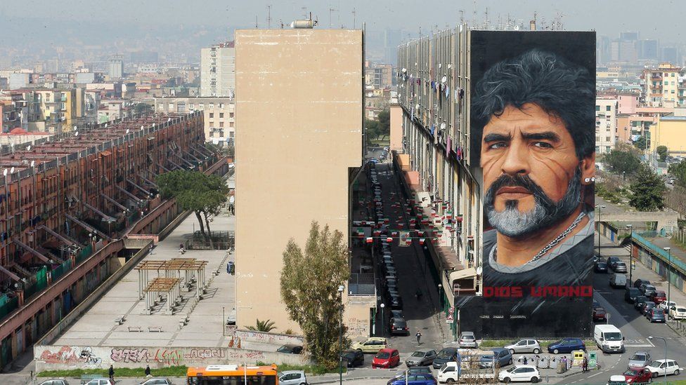 Image shows a Diego Maradona mural in Naples