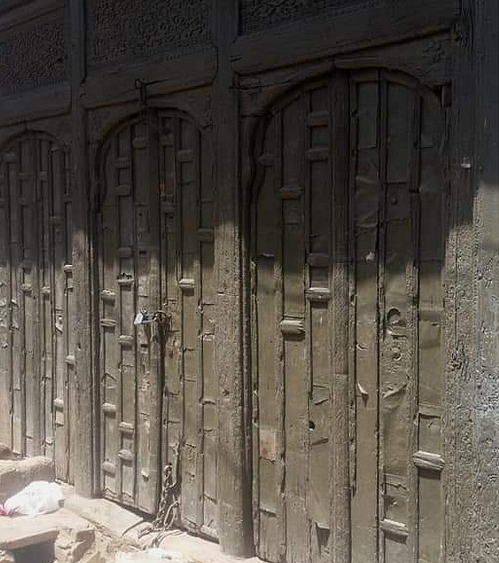 Ornate wooden doors and window were among the features burned by the mob
