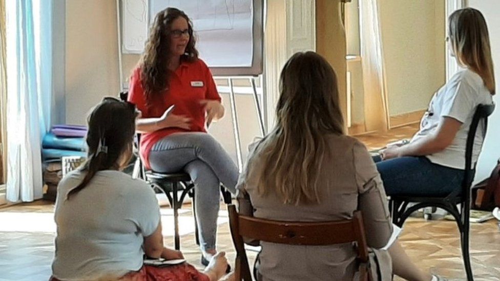 Rachel offering psychological support to volunteers in Poland