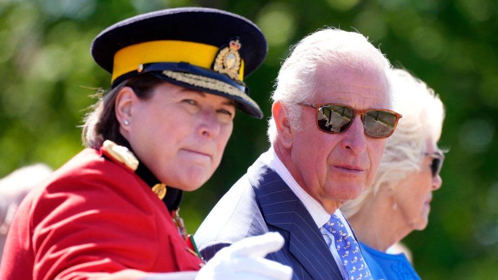 Britain's Prince Charles and Camilla, Duchess of Cornwall talk with RCMP Commissioner Brenda Lucki as they watch the Royal Canadian Mounted Police (RCMP) in Ottawa, Ontario, on their Canadian Royal Tour, May 18, 2022