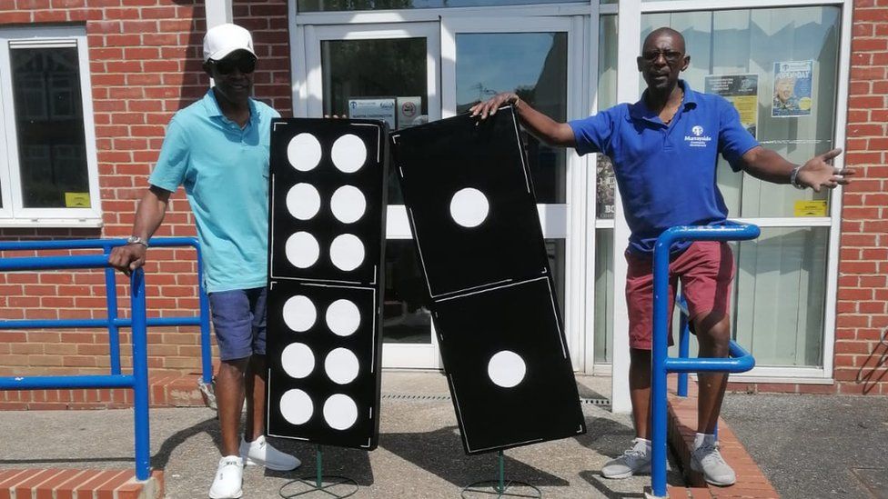 Lawrence Walker and Max Thomas with giant dominoes