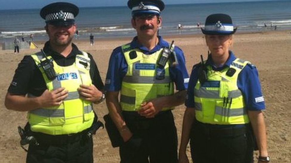 Police officers on Mablethorpe beach