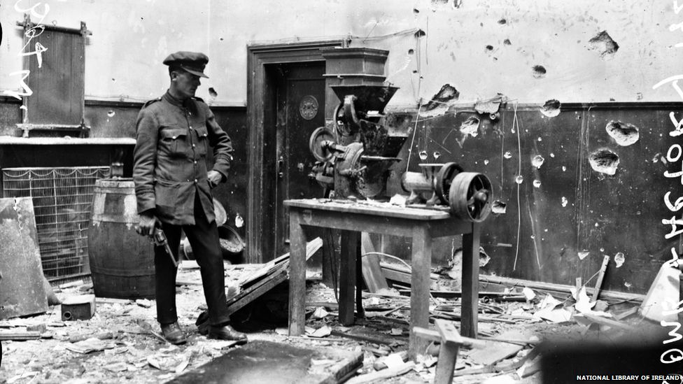 A soldier surveys the damage to the PRO in 1922