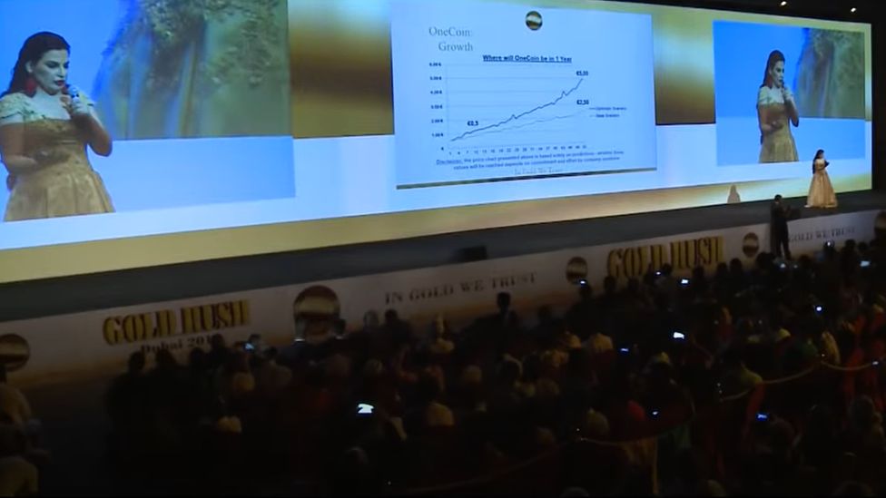 Dr Ruja on the stage at a 2015 OneCoin event in Dubai