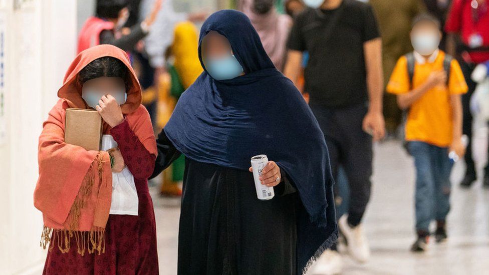 Refugees from Afghanistan at Heathrow Airport in 2021