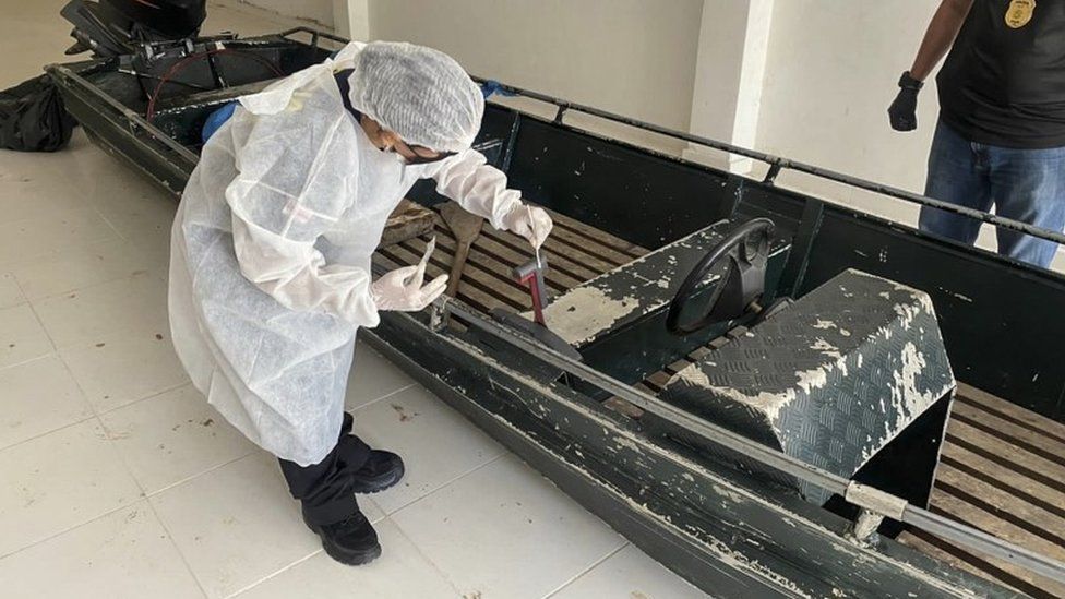 Forensic experts examine a boat with traces of blood in Vale Do Javari, Brazil, 09 June 2022