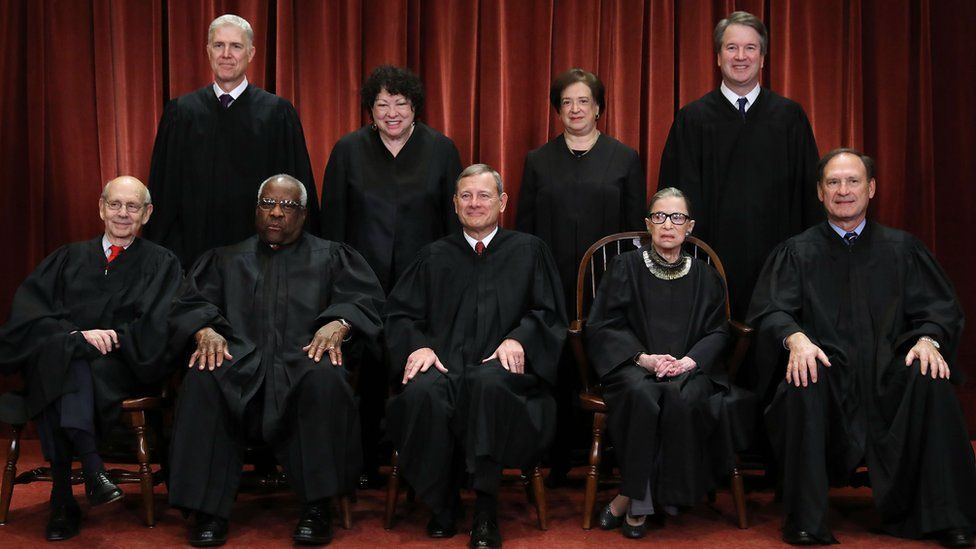 US Supreme Court (Front L-R) Stephen Breyer, Clarence Thomas, Chief Justice John Roberts, Ruth Bader Ginsburg, Samuel Alito, Jr; (Back L-R) Neil Gorsuch, Sonia Sotomayor, Elena Kagan and Brett Kavanaugh