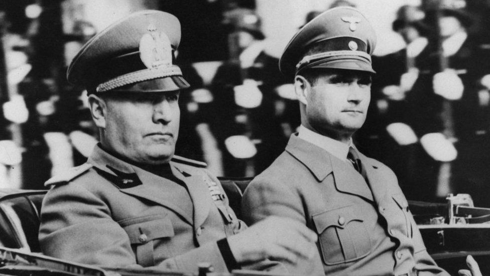 Nazi Party official Rudolf Hess (1894 - 1987, right) in a car with Italian leader Benito Mussolini, circa 1938. (Photo by Keystone/Hulton Archive/Getty Images)