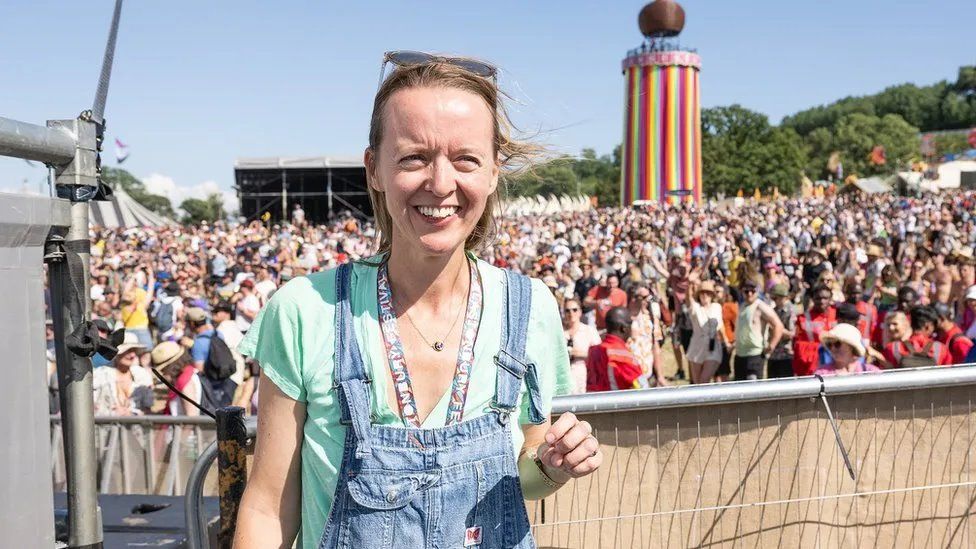 Emily Eavis in front of a Glastonbury crowd