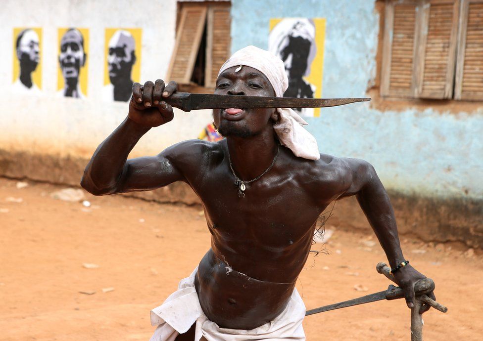 An Ivorian man participates in a ritual as part of the Dipri festival in Sikensi, south-eastern Ivory Coast.