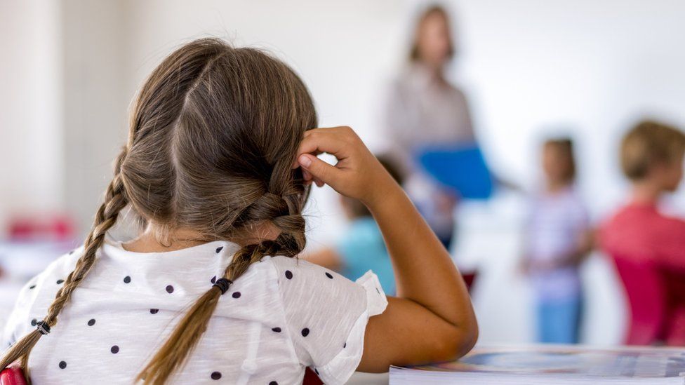 Schoolgirl in classroom