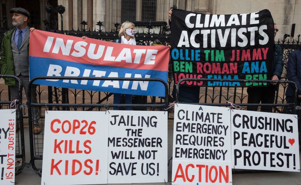 Insulate Britain supporters protesting outside the Royal Courts of Justice after the sentencing on 17 November 2021