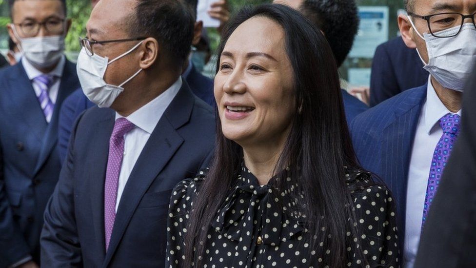 Meng Wanzhou (C) leaves British Columbia Supreme Court and speaks to the media in Vancouver, British Columbia, Canada 24 September 2021.