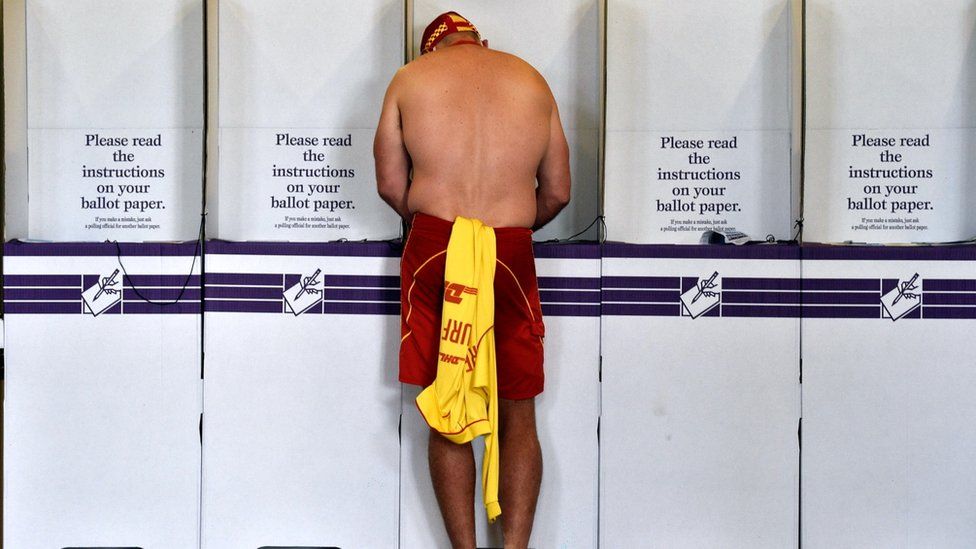 Lifesaver voting at polling station