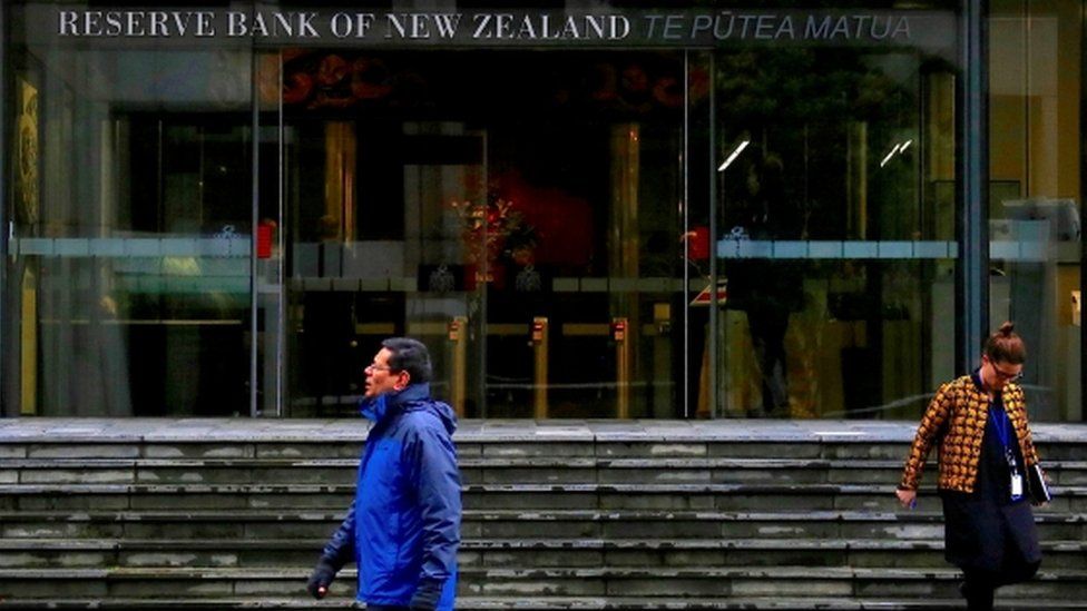 People outside the Reserve Bank of New Zealand in Wellington.