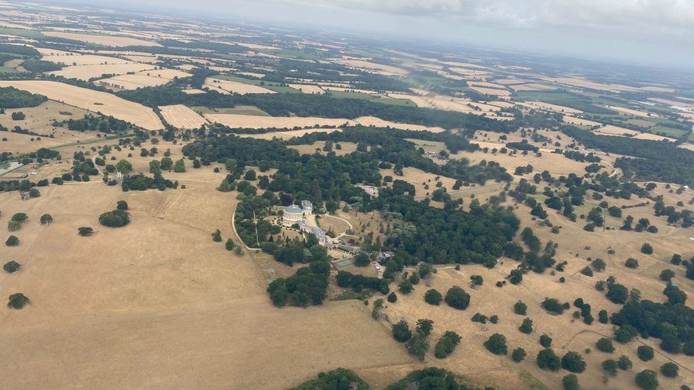 Aerial view of parched lawns around Ickworth