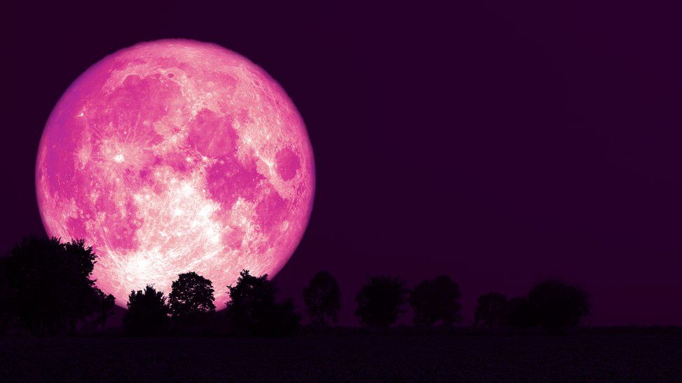 A picture of a bright pink moon