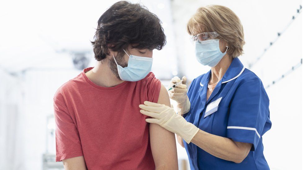 A man having a Covid vaccination