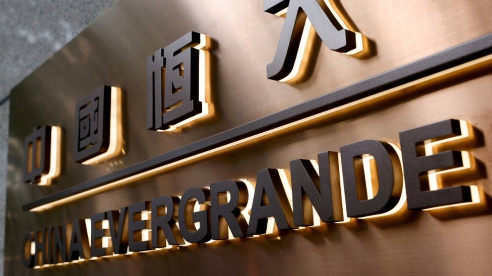 Evergrande sign on building.