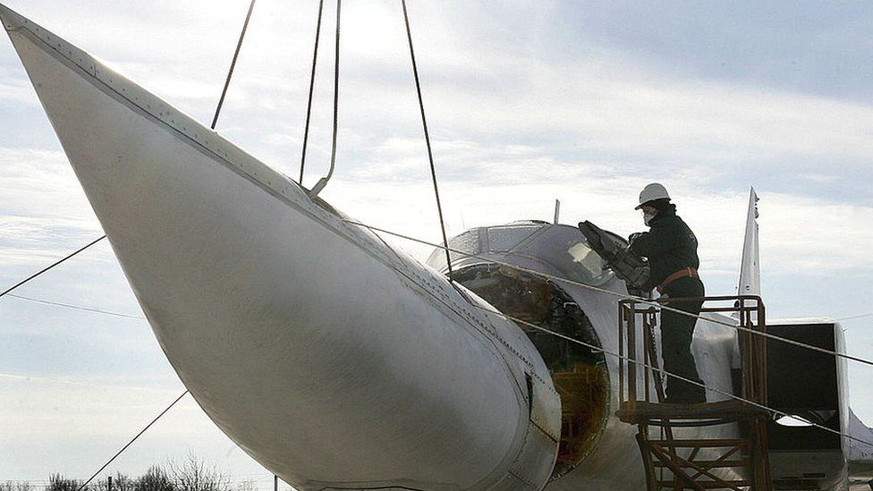 A nuclear weapons-capable bomber being dismantled in Ukraine