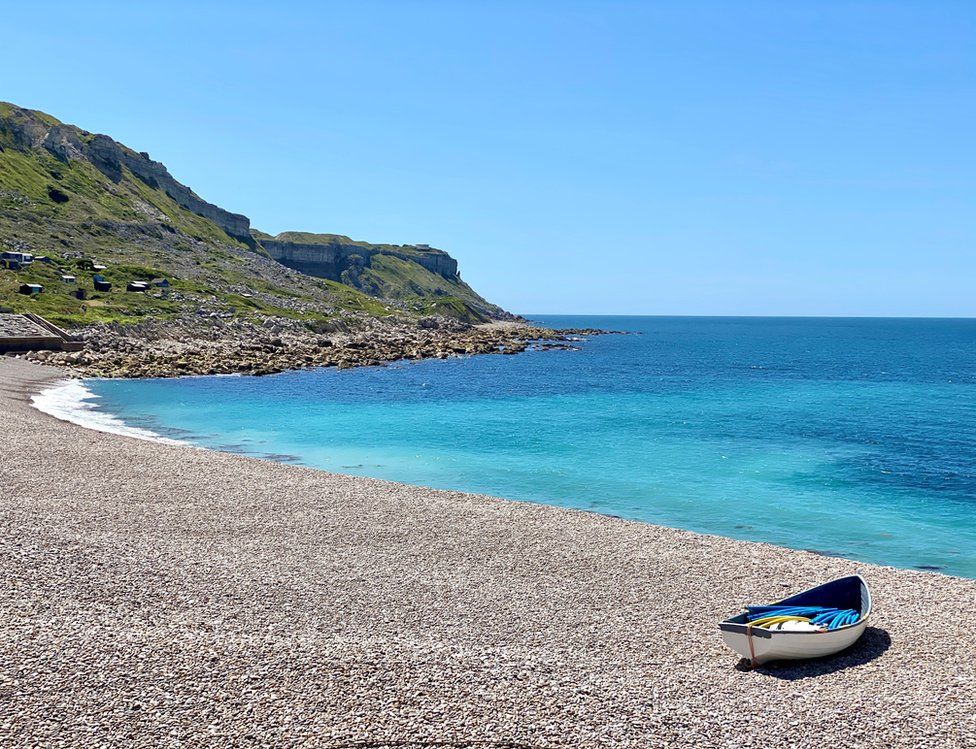 A boat on a pebble beach