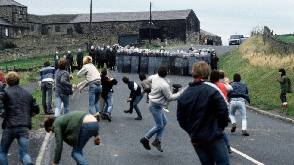 Miners clash with police in Woolley
