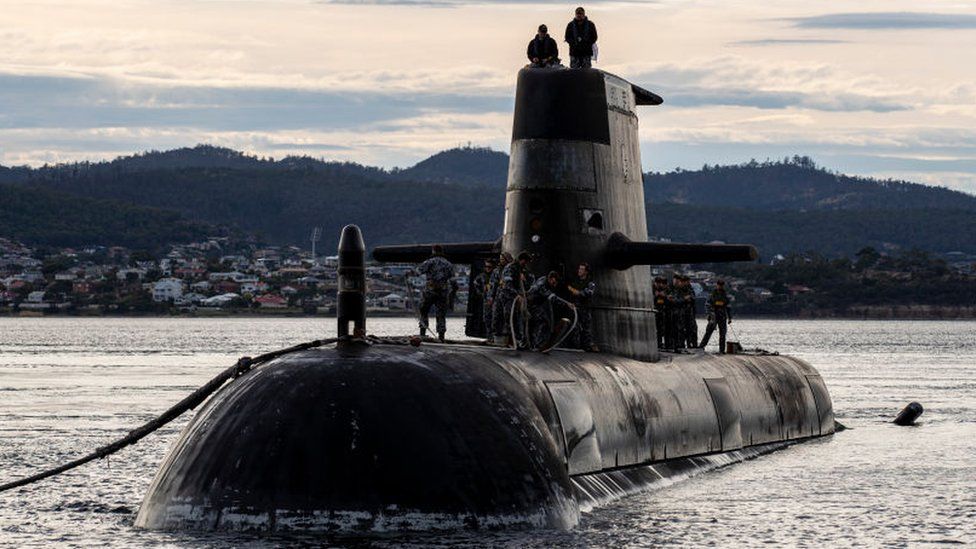 Royal Australian Navy submarine HMAS Sheean arrives for a logistics port in Hobart.