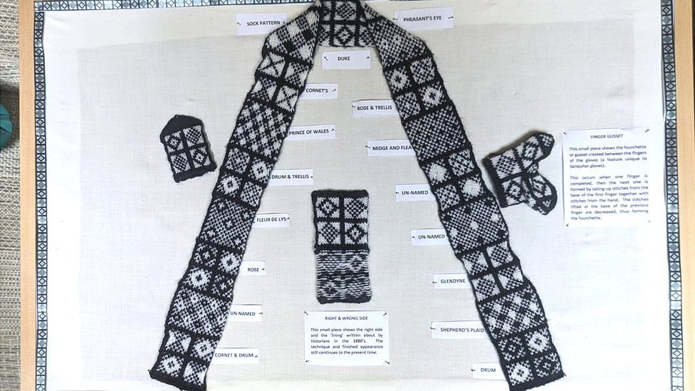 This display shows one sock pattern and the 16 Sanquhar glove patterns, some of which are nameless.