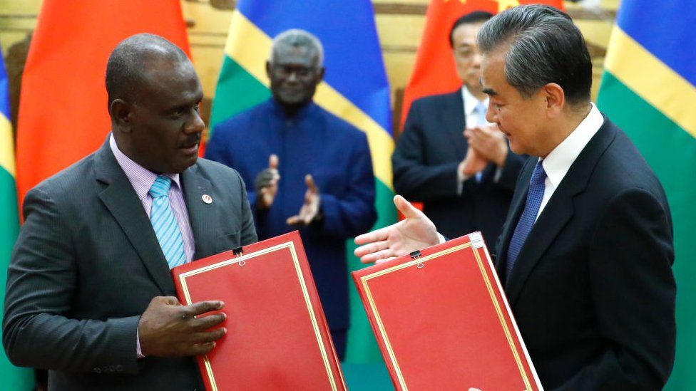 Solomon Islands Prime Minister Manasseh Sogavare attends a meeting with Chinese Premier Li Keqiang