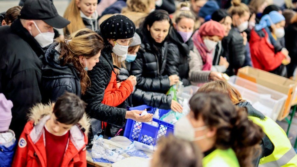 Refugees receiving aid in Berlin, Germany