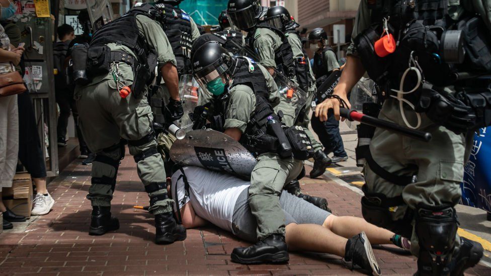 A man is detained by riot police during a demonstration on July 1, 2020 in Hong Kong, China.