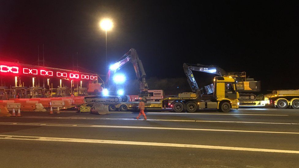 The toll booths of the M4 Prince of Wales bridge begin to be removed
