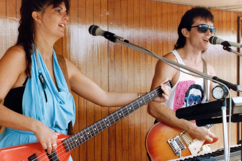 Tracy and Moss performing on board a cruise ship