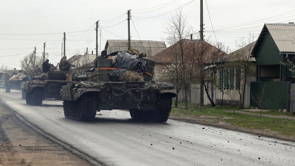 Tanks of Ukrainian Armed Forces ride along a street in a village, as Russia's attack on Ukraine continues, in Donetsk Region, Ukraine April 18, 2022.