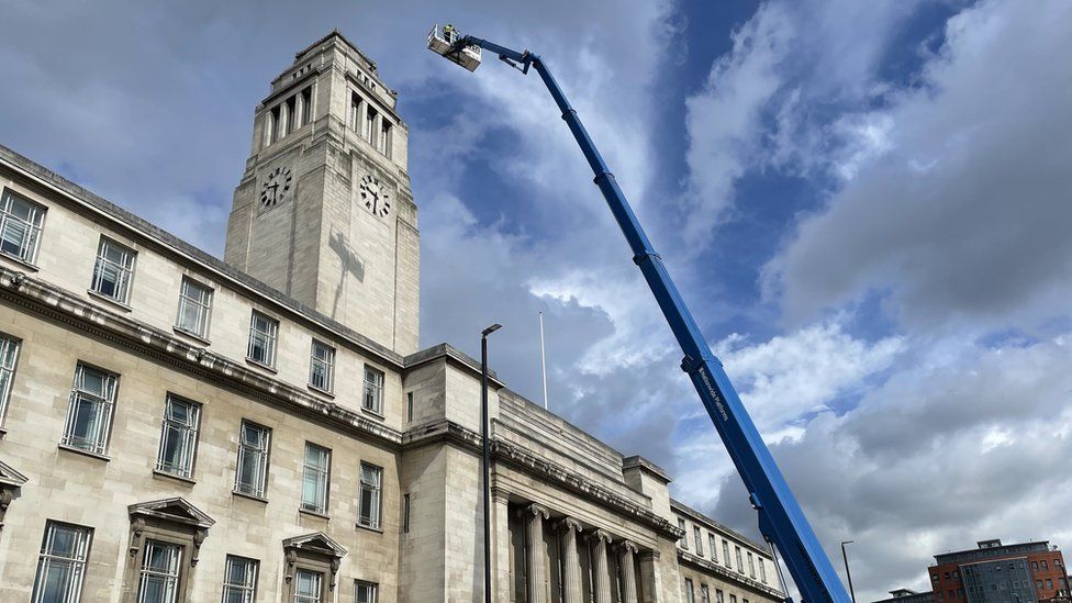 Netting being removed from the Parkinson building