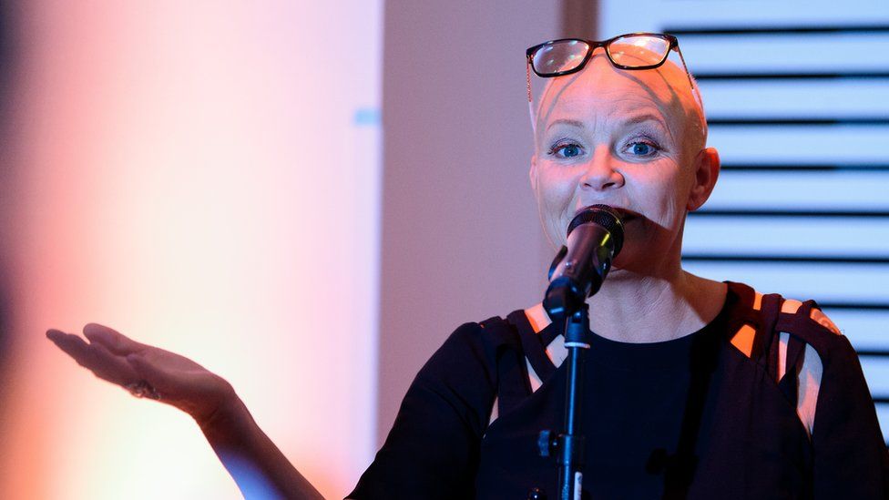 Gail Porter speaking from behind a microphone