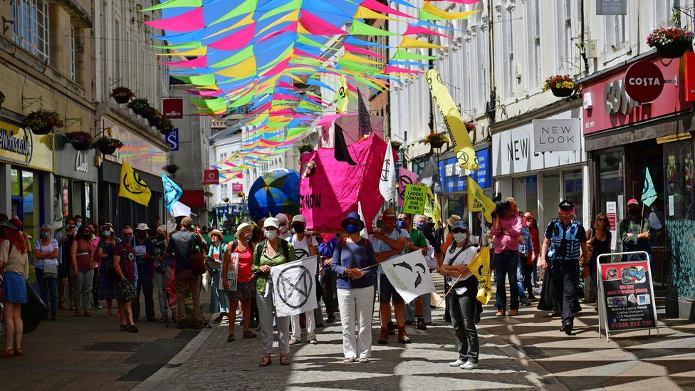 Protestors take part in an XR protest in Falmouth, during the G7 summit in Cornwall. Picture date: Saturday June 12, 2021.