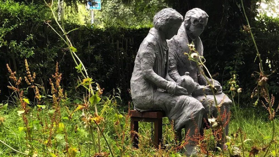Sculpture of two women located at the Downs in Bristol, based off of Victoria Hughes