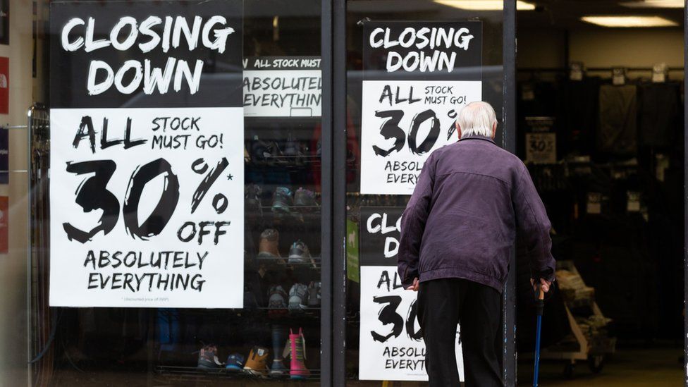 Closing down signs at a shop in Huddersfield, West Yorkshire