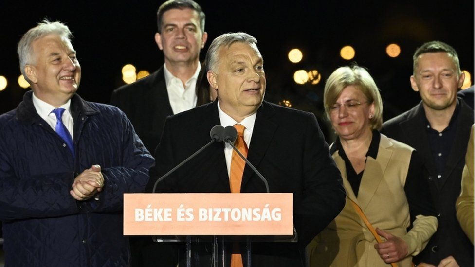 Hungarian Prime Minister Viktor Orban (C) delivers a speech during the governing Fidesz party's event after the general election