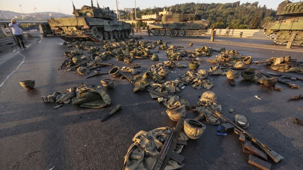 Arms and clothes dumped by Turkish soldiers