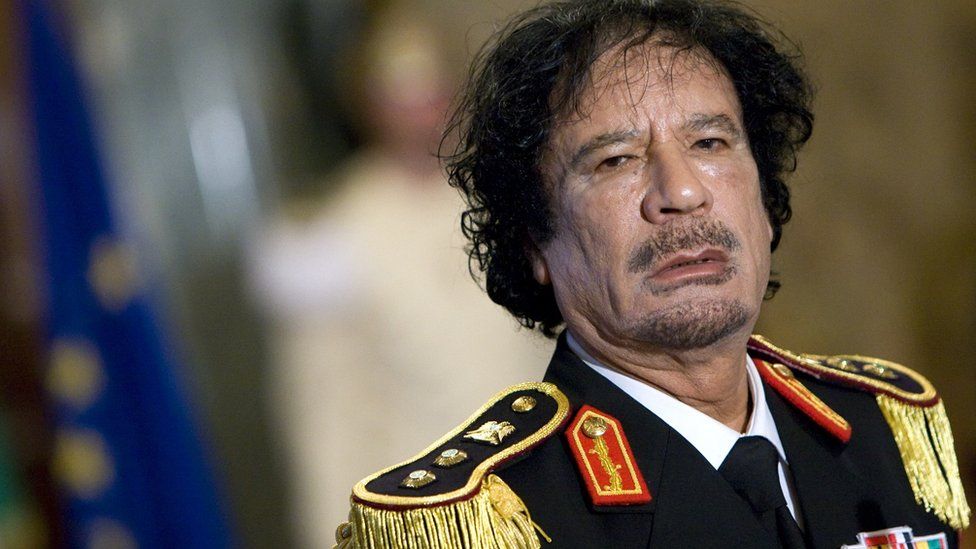 Muammar Gaddafi during a news conference at the Quirinale palace in Rome June 10, 2009