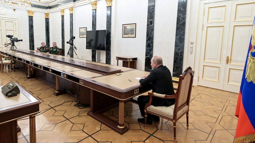 Russian President Vladimir Putin attends a meeting with Defence Minister Sergei Shoigu and Chief of the General Staff of Russian Armed Forces Valery Gerasimov in Moscow, Russia February 27, 2022