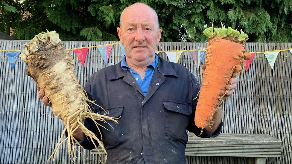 Joe Atherton with his giant vegetables