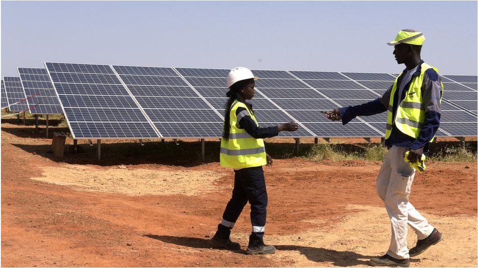 Technicians at a solar power facility in Senegal