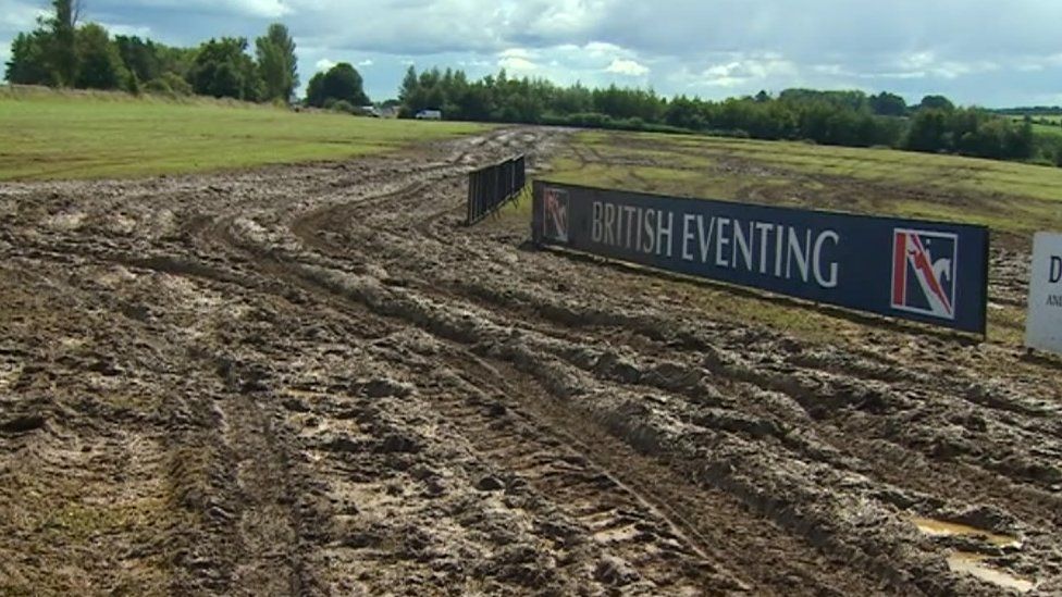 The field at Gatcombe Park covered in mud