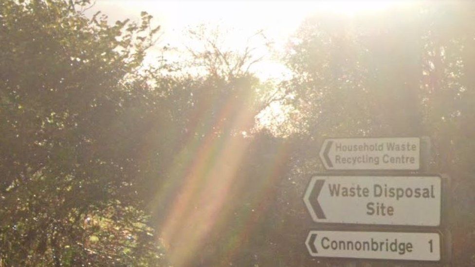 Signs to waste disposal site at Connonbridge
